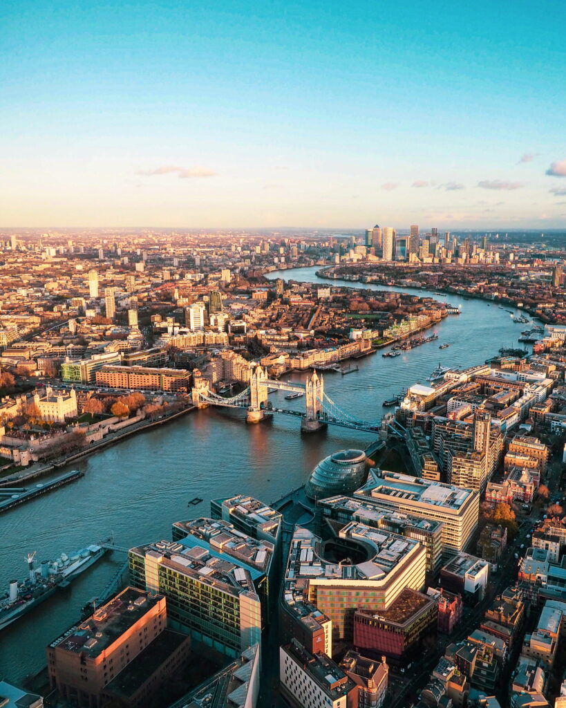 coach hire in london - view of london and the thames with the tower of london